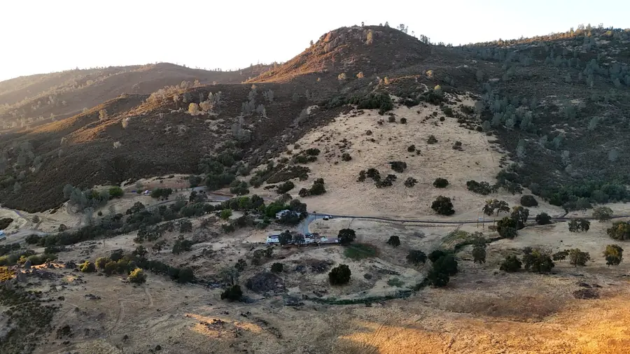 Aerial view of ranch roads and oak hills on Penon Blanco Peak