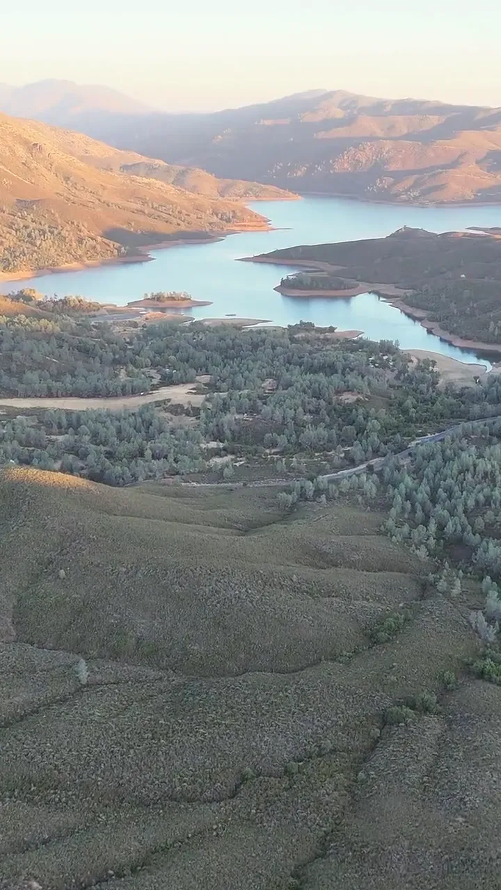 Drone flight over Lake McClure at golden hour